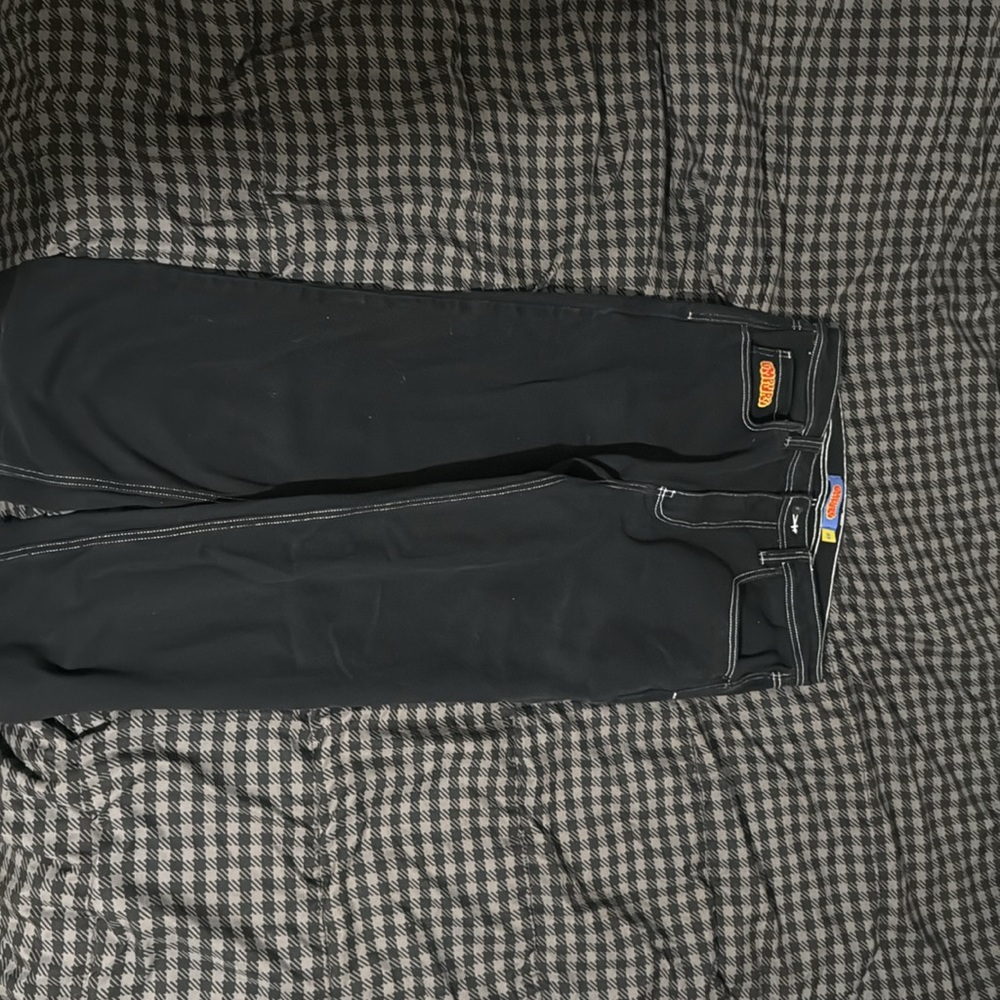Black Empyre Pants, Size 33 with white stitching,